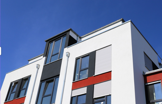 A building with a blue sky in the background