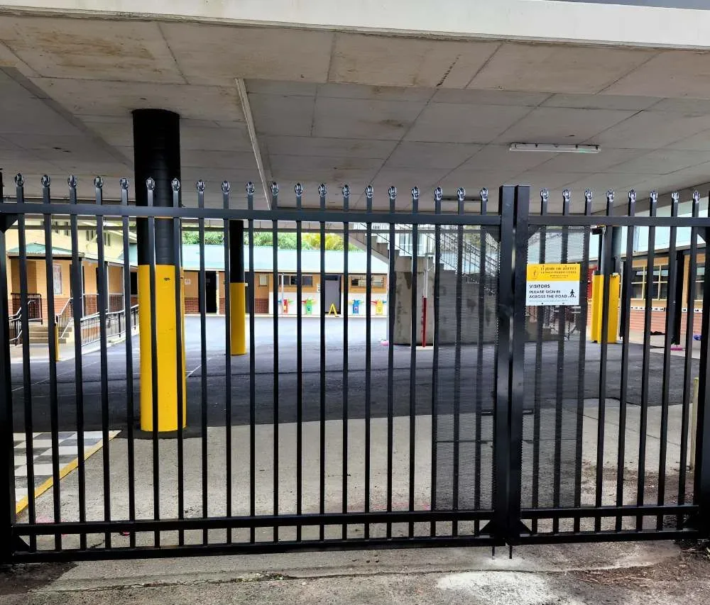 Black Metal Security Gate — Strike Fencing & Gates In Bateau Bay, NSW