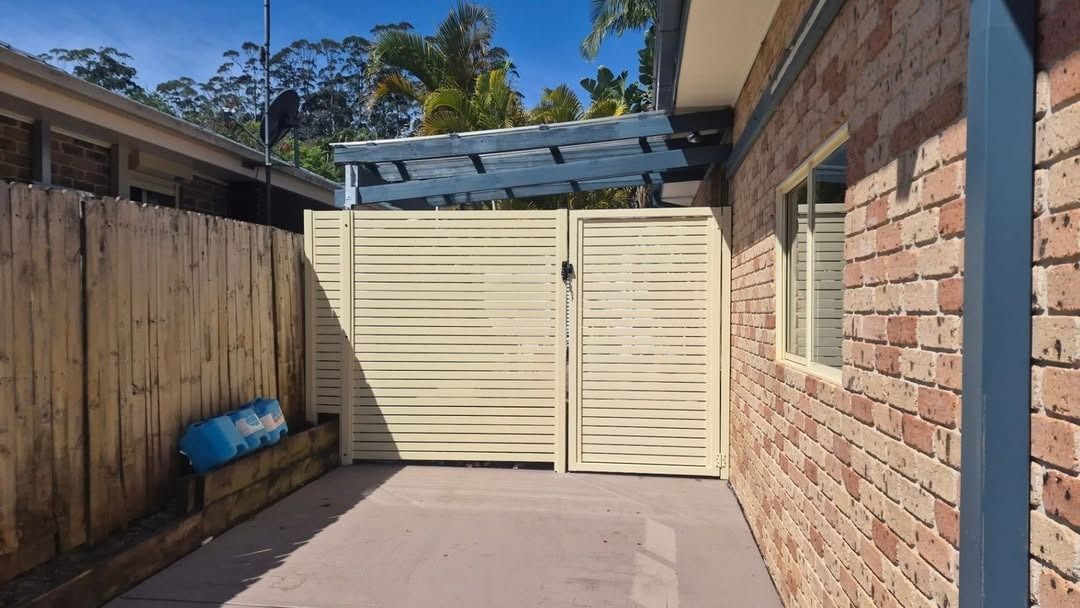 Narrow Side Yard with Brick Wall, Wooden Fence — Strike Fencing & Gates In Terrigal, NSW