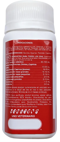 Frasco de medicamento líquido “Combit Oral”, etiqueta roja y blanca, 120 mL.