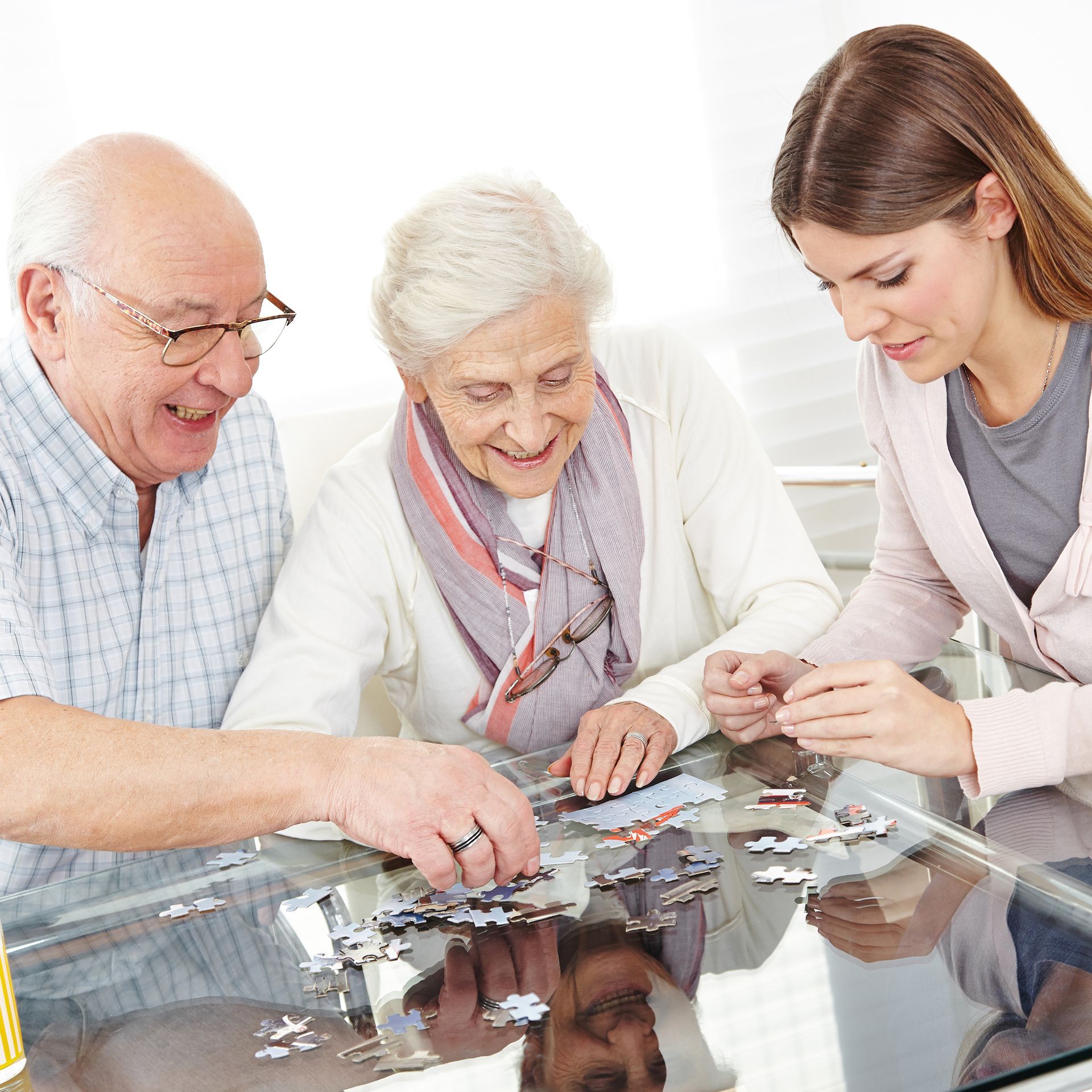 Joyful caregiver supporting seniors in activity – Arizona home care services