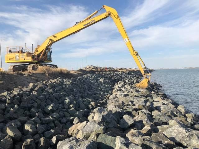 Long reach moving rocks