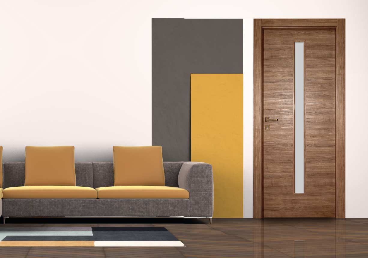 soggiorno con divano e porta in legno