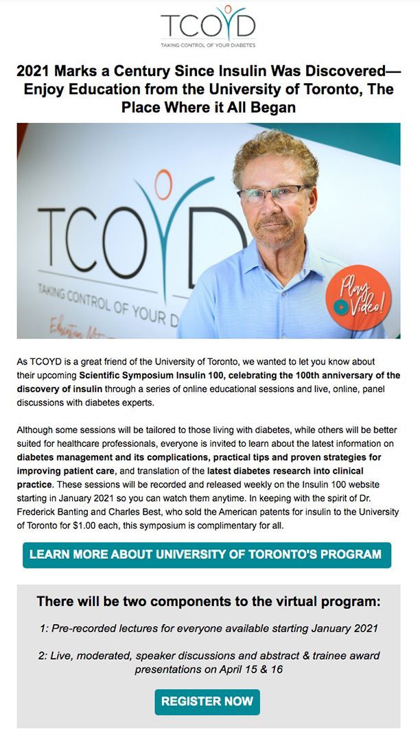 A man is standing in front of a sign that says tcoyd.