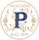 Logo Procopio con corona floreale dorata, P blu e oro e testo «DAL 1975»