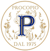 Logo Procopio in oro e blu, con monogramma floreale ornato e la scritta “DAL 1975” in un logo circolare