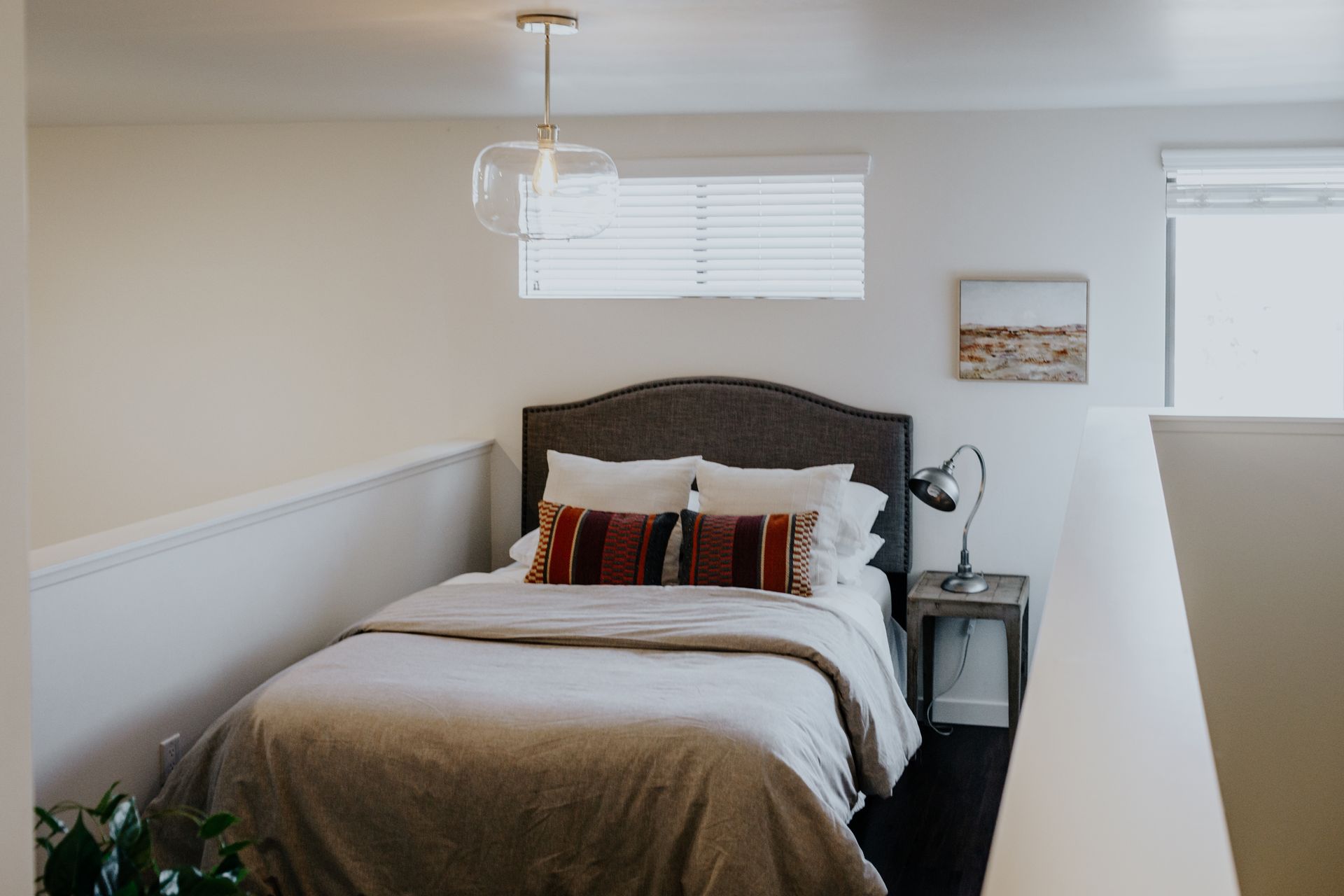 Spacious loft bedrooms with natural lighting