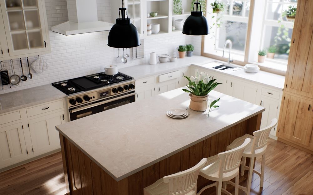A kitchen with a large island and a stove top oven