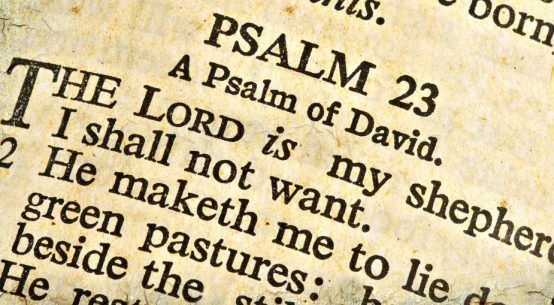 Close-up of a Bible page, showing Psalm 23, with the words 