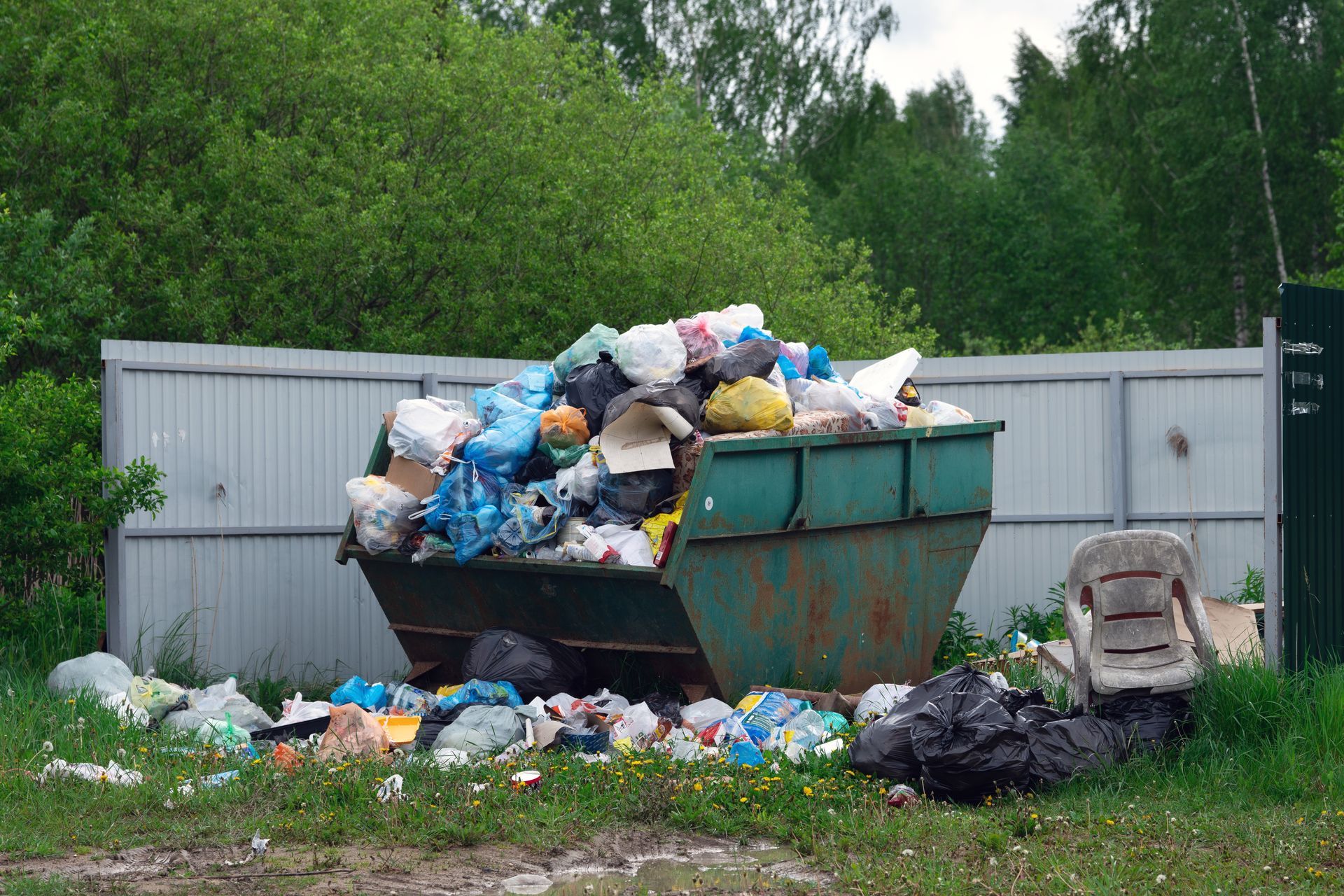 Overflowing dumpster