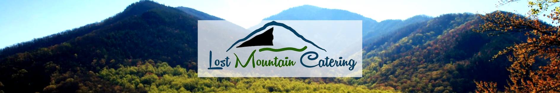 Mountain resort logo centered over a scenic valley backdrop with green hills and blue sky