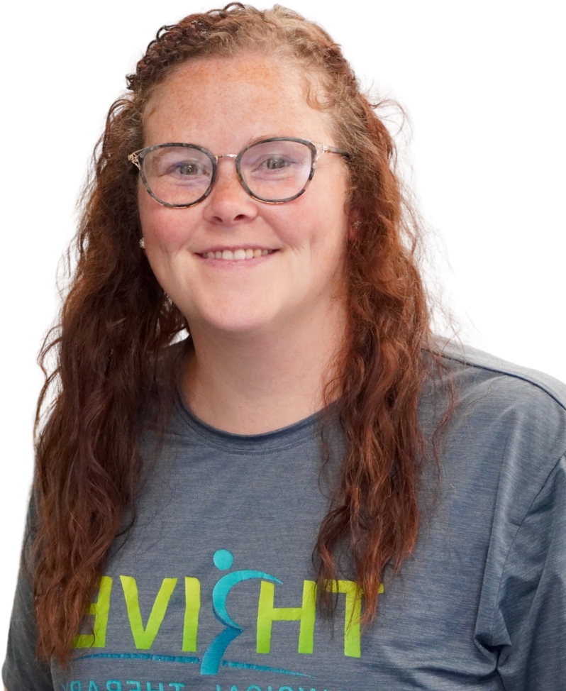 Smiling person with glasses wearing a gray T-shirt with colorful text on a white background