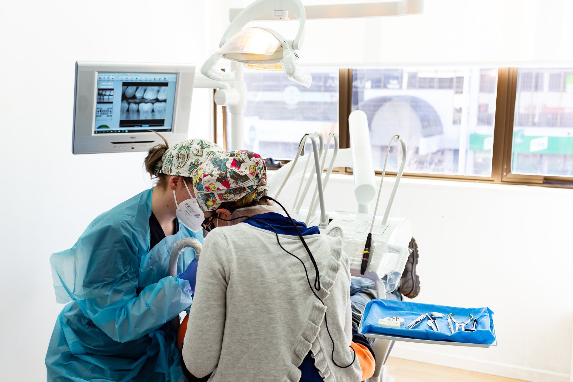 Patient with dentist and assistant | Rosny Park, TAS | Bayfield Dental Patient with dentist and assistant | Rosny Park, TAS | Bayfield Dental