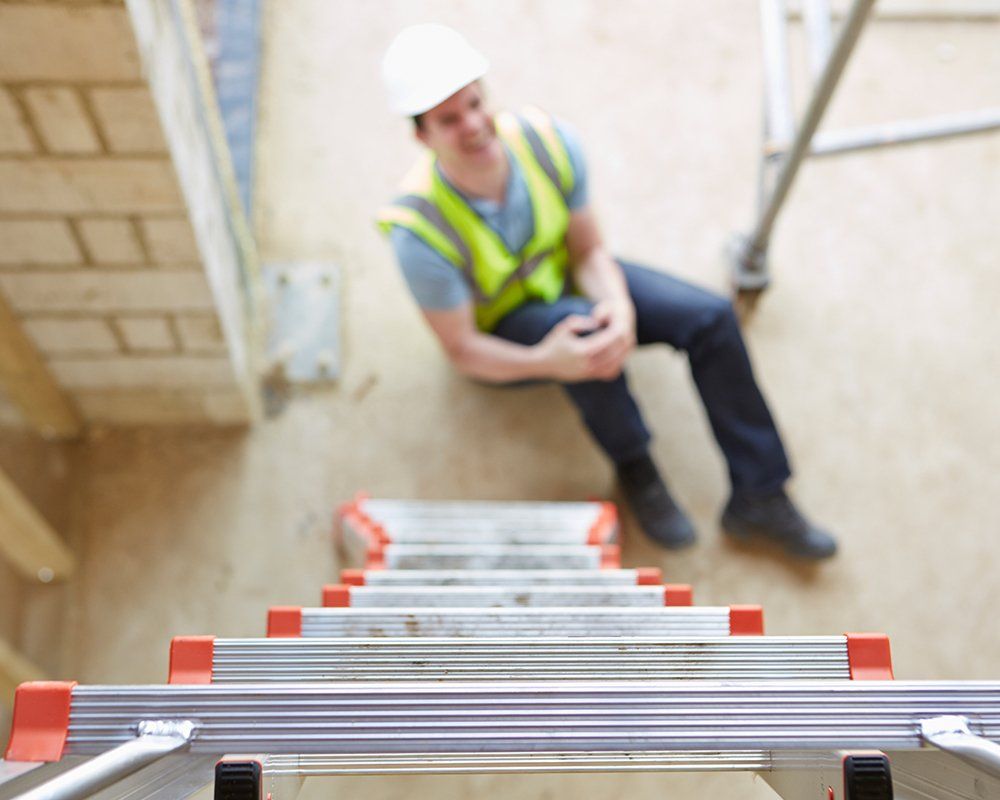Construction Worker Falling Off Ladder — Tukwila, WA — Law Offices of Daniel R. Whitmore, P.S. Construction Worker Falling Off Ladder — Tukwila, WA — Law Offices of Daniel R. Whitmore, P.S.