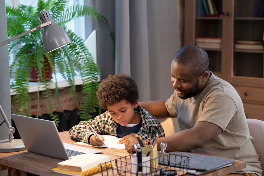 Parent helping child with homework