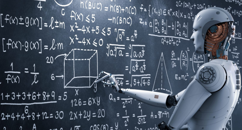 A robot is standing in front of a blackboard with equations on it