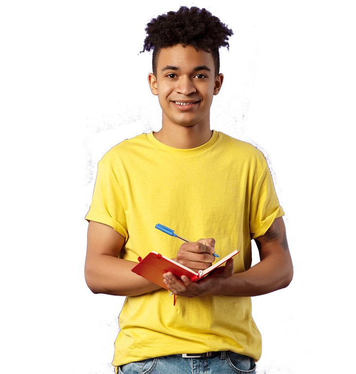 A young man in a yellow shirt is holding a notebook and a pen.