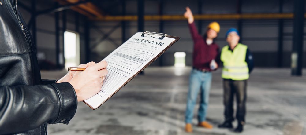 Clipboard With Checklist Held in Foreground — Tick of Approval Pty Ltd in Berrimah, NT