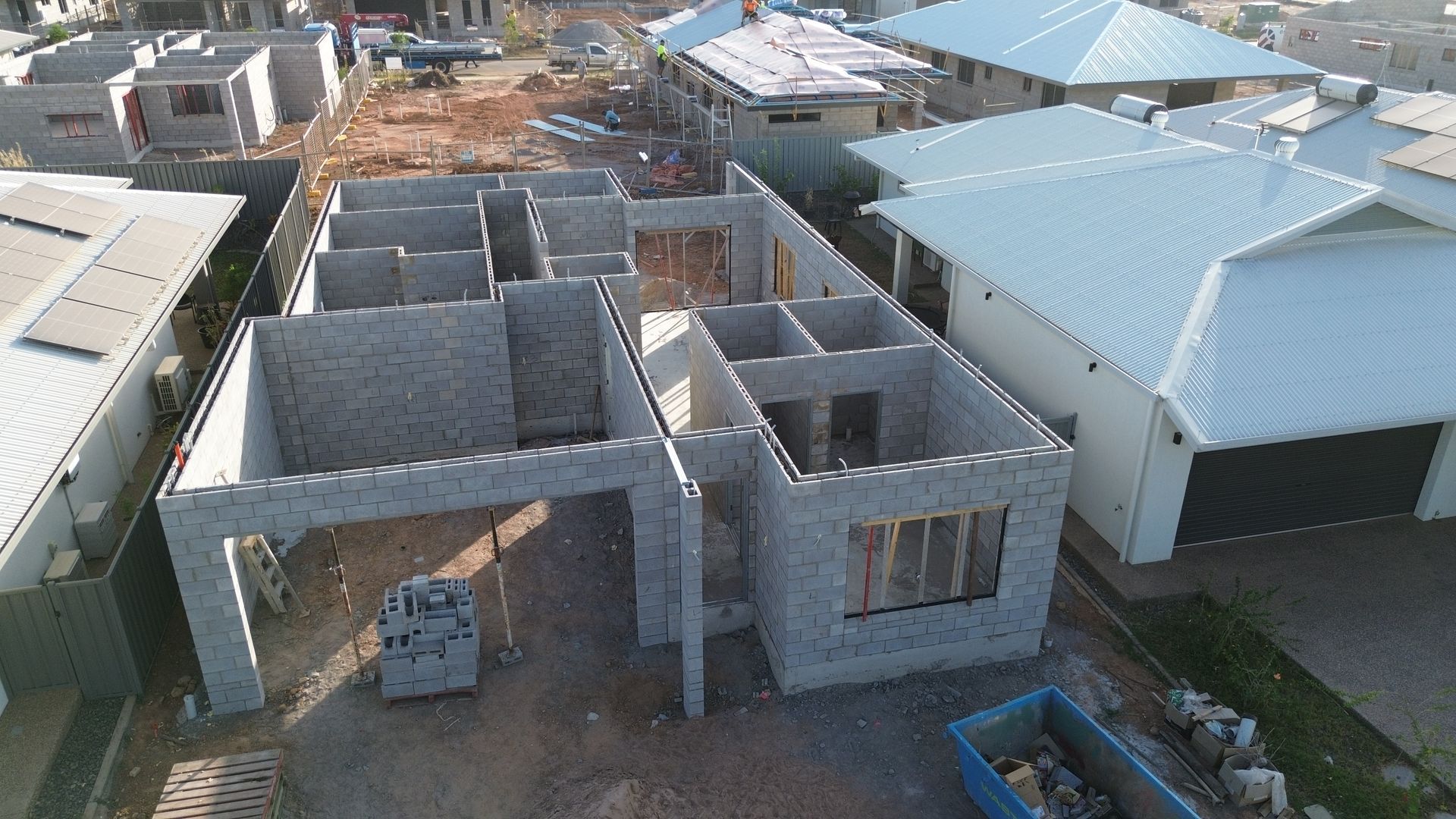 Partially Built Concrete House Foundation With Walls and Roof Trusses — Tick of Approval Pty Ltd in Berrimah, NT