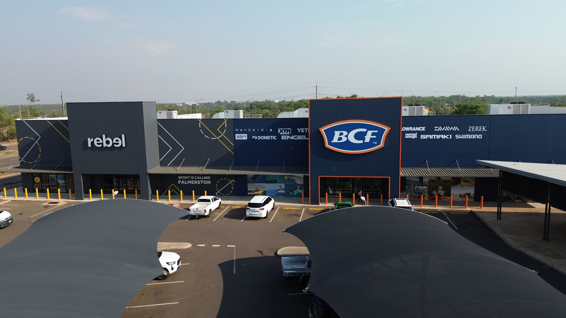 Storefronts in a Shopping Center Parking Lot — Tick of Approval Pty Ltd in Berrimah, NT