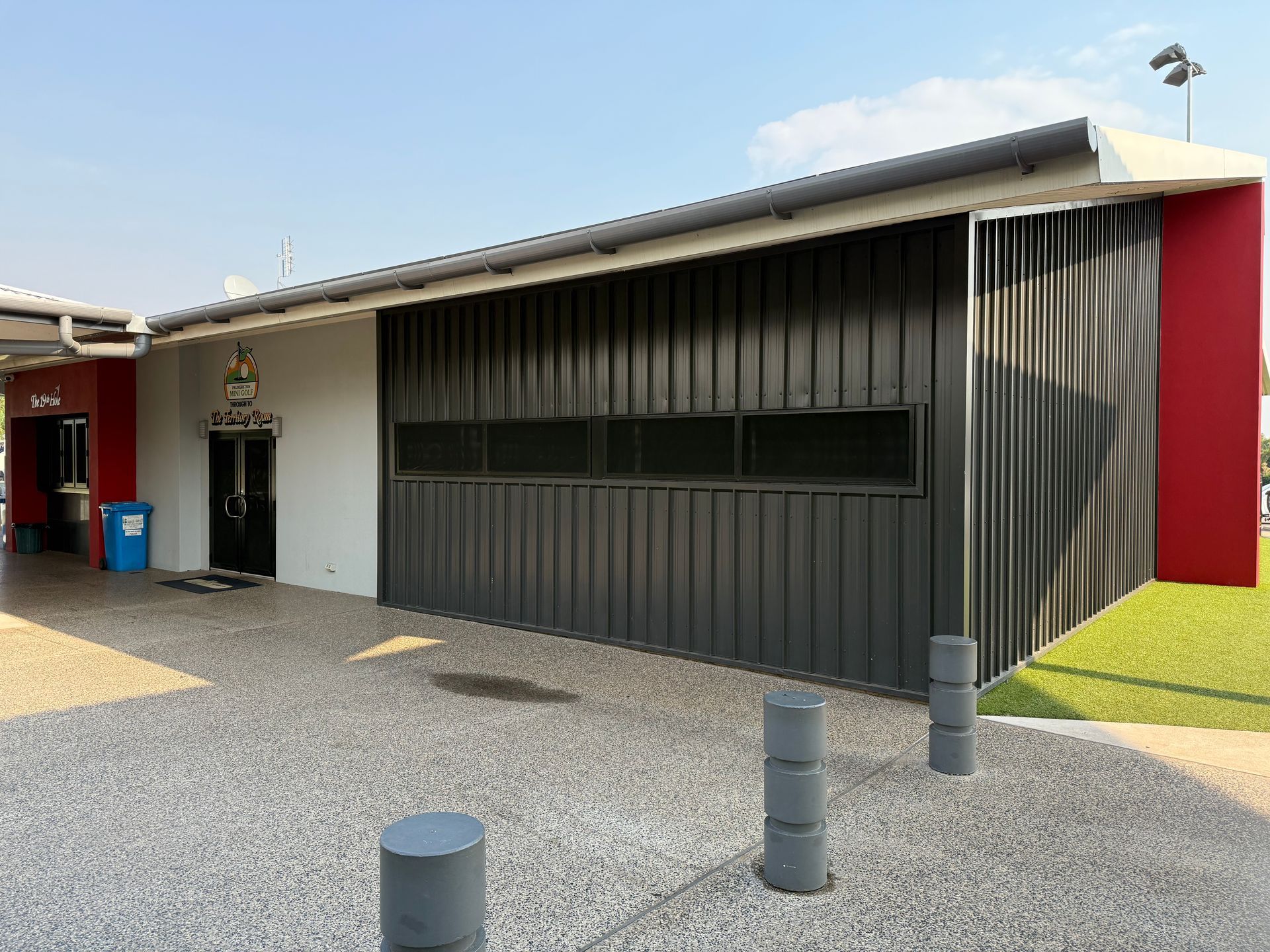 Modern Building Exterior With Dark Siding — Tick of Approval Pty Ltd in Palmerston, NT