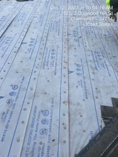 Roof underlayment being installed at 123 Dagwood, Clermont FL.