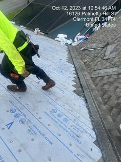 Roofer on a roof, installing underlayment on Oct 12, 2023, at 10:54:46 AM, 16126 Palmetto Hill St, Clermont FL 34714, United States.