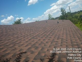 View of a brown shingle roof on a sunny day in Haines City, Florida. Timestamp: June 16, 2025, 2:29 p.m.
