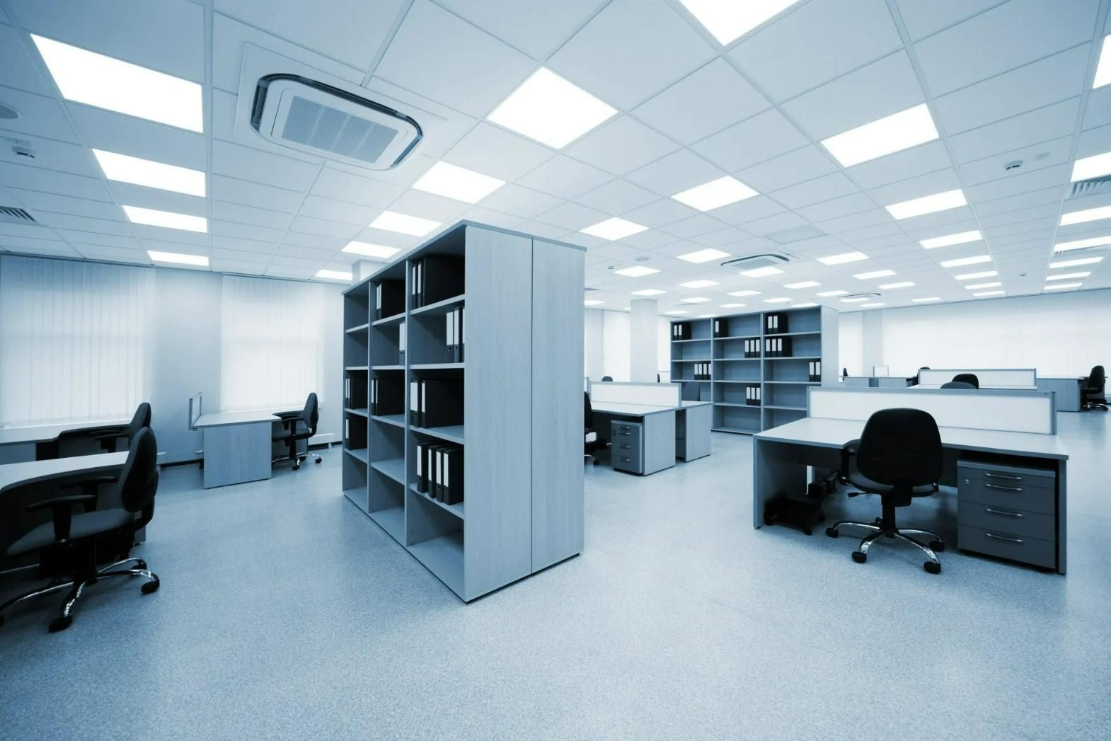 A large office with a lot of desks and chairs — Gleeson's Air Conditioning in Port Macquarie, NSW