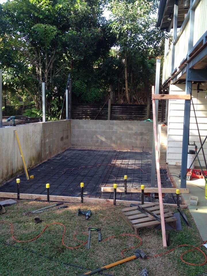A Concrete Base is Being Built in the Backyard of a House — NGK Constructions In Freshwater, QLD