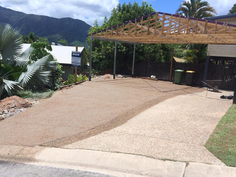 A Driveway With a Carport and a Sign That Says for Sale — NGK Constructions In Freshwater, QLD