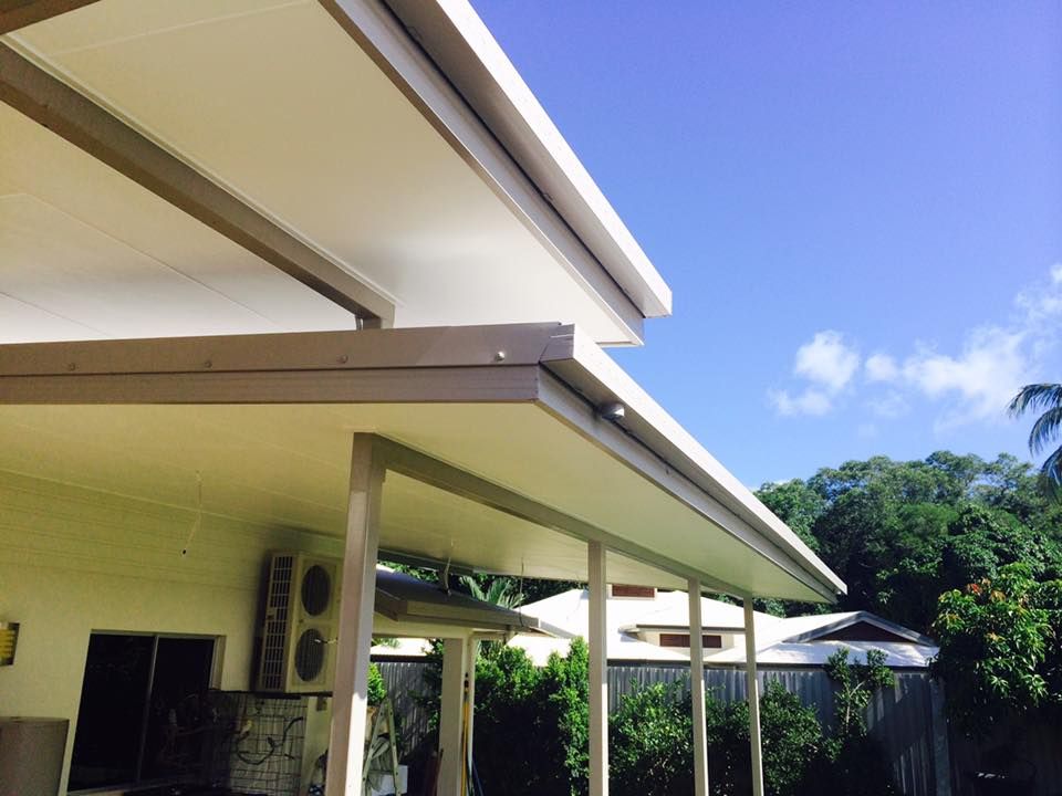 A House With a Covered Porch and a Blue Sky in the Background — NGK Constructions In Freshwater, QLD
