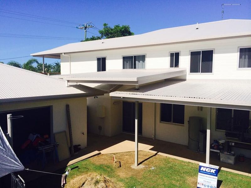 A White House With a Sign in Front of It That Says MCGE — NGK Constructions In Freshwater, QLD
