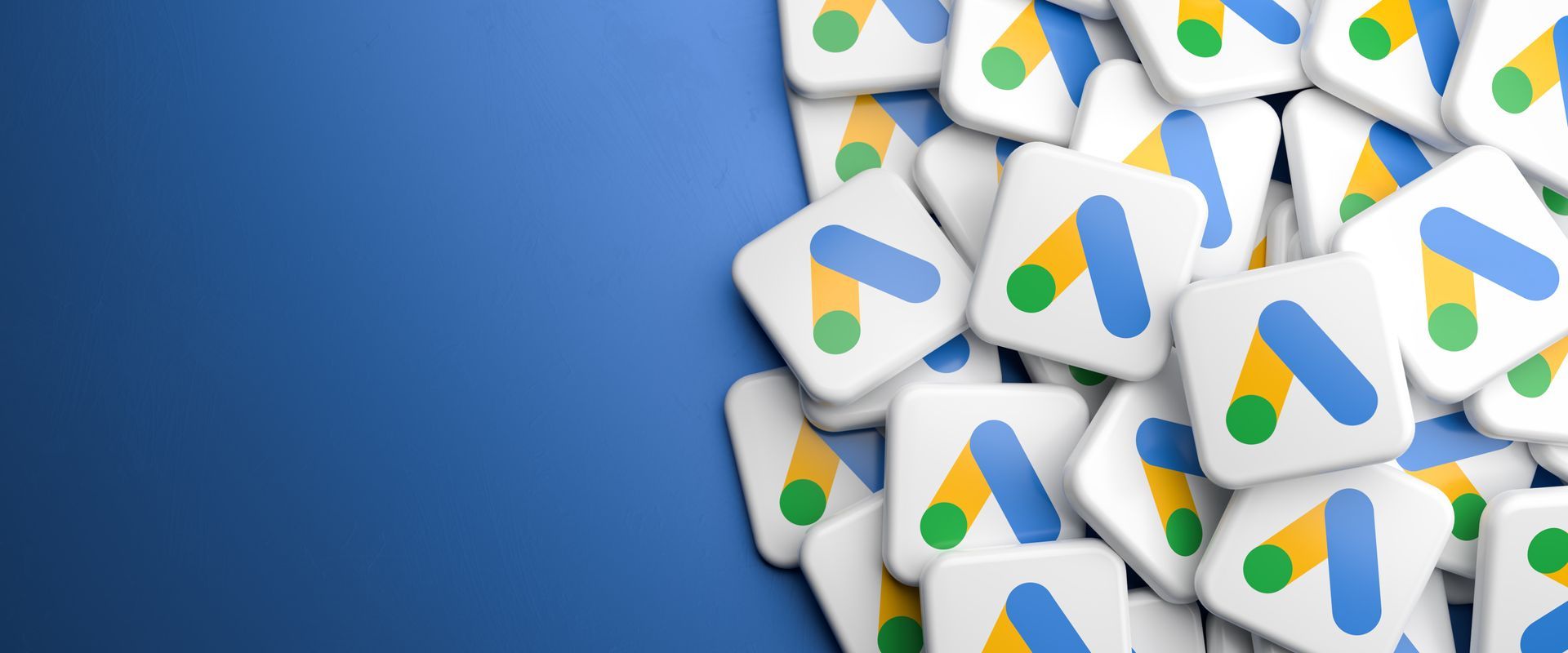 A pile of google ads icons on a blue background.