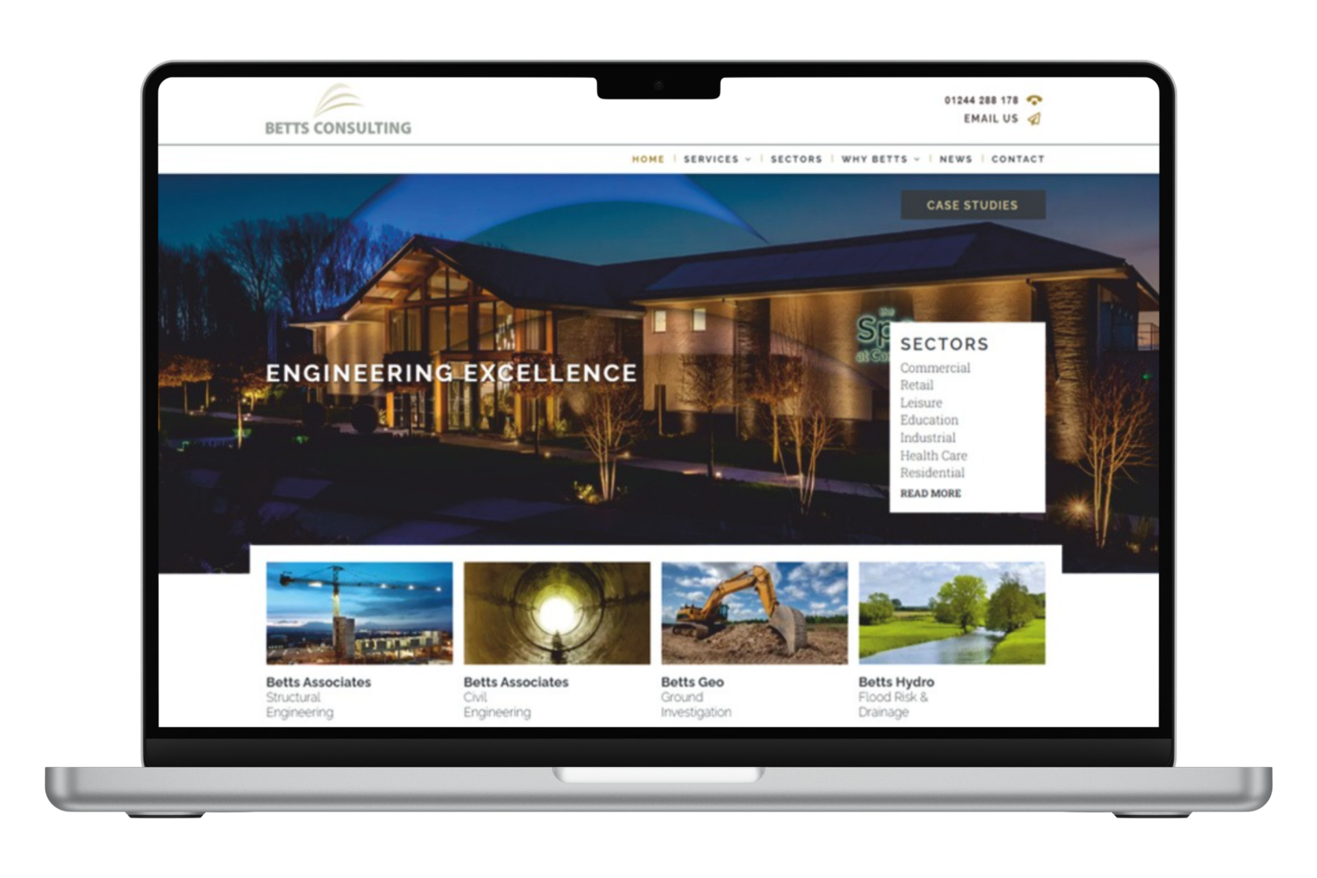 a laptop computer is open to a website with a picture of a house on it .