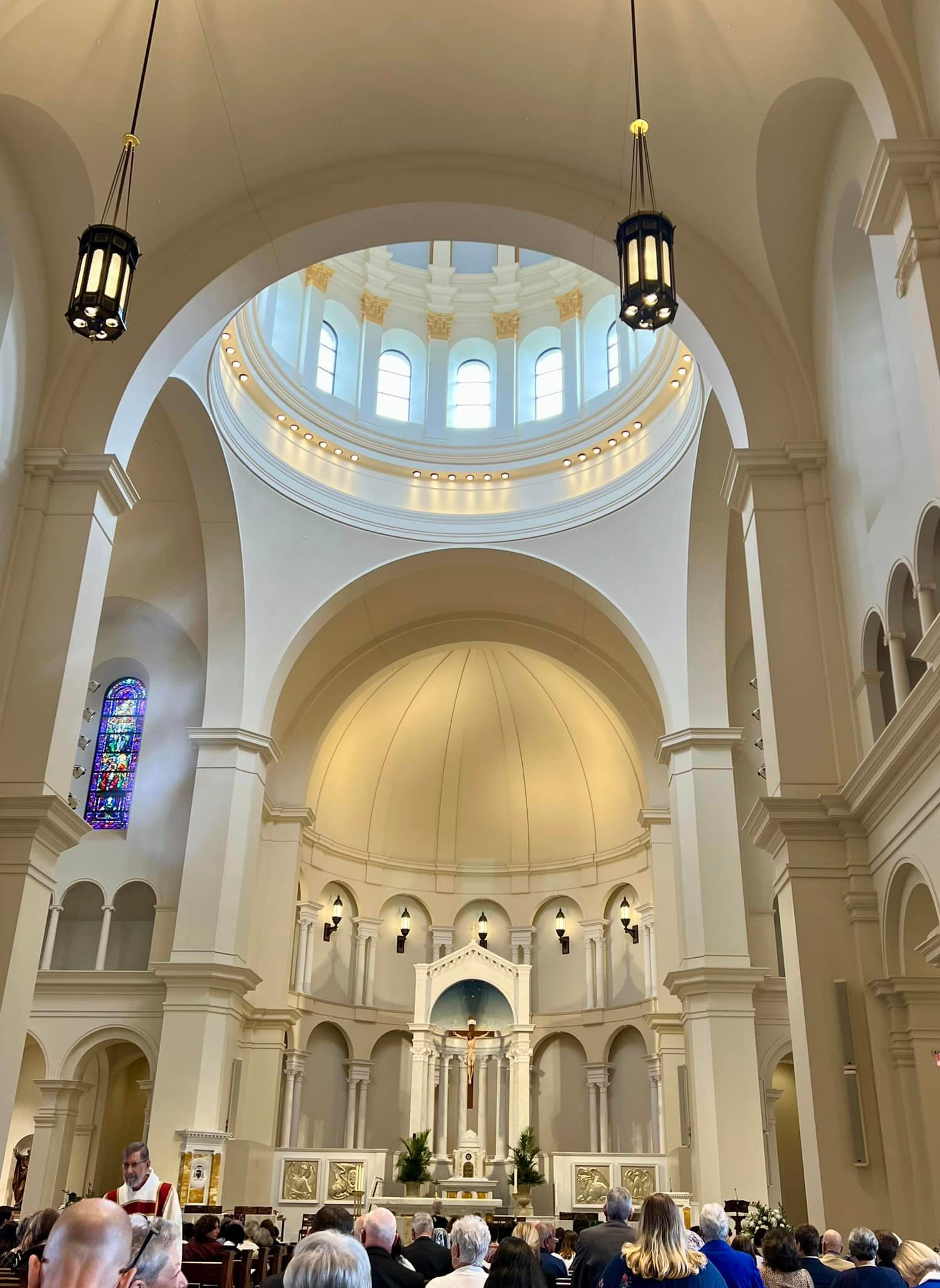 A church with a dome and stained glass windows
