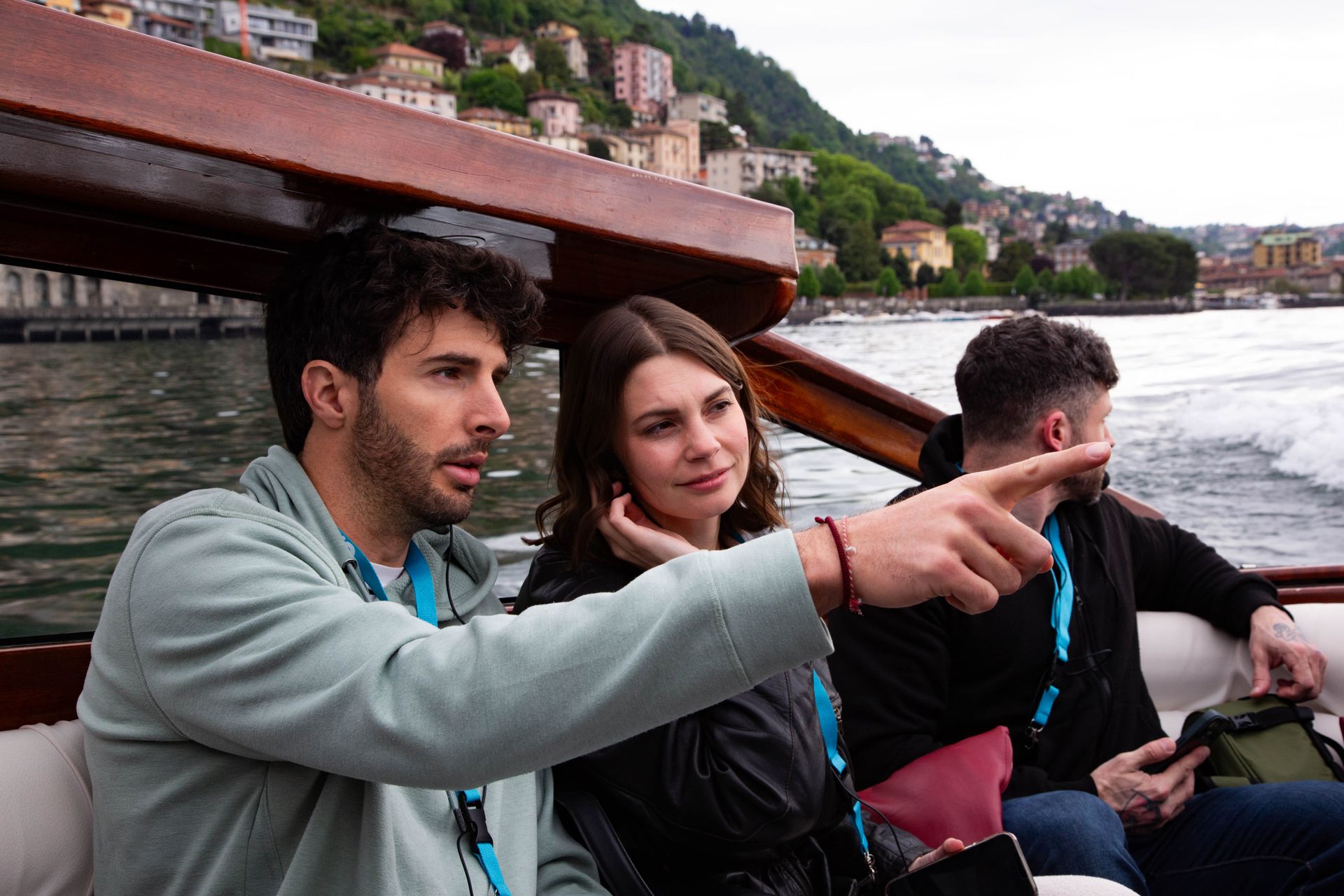 Couple enjoying a boat tour on Lake Como.