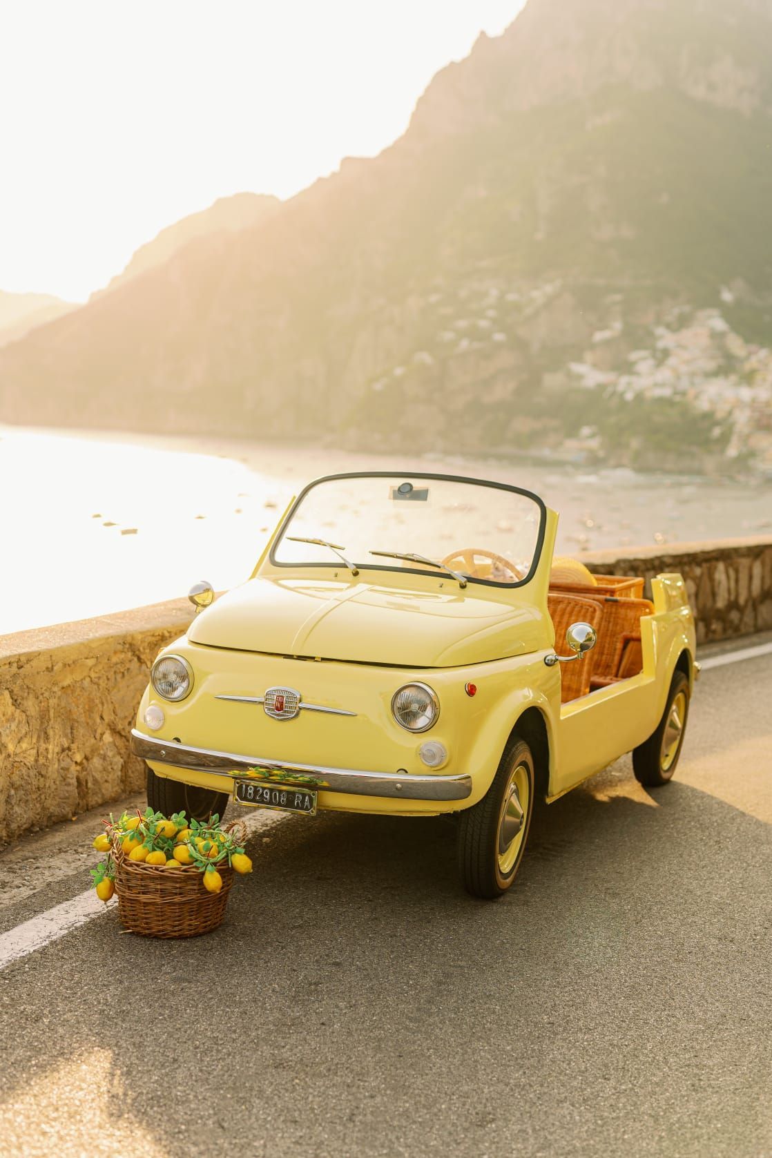 Fiat 500 convertible driving on the Amalfi Coast.