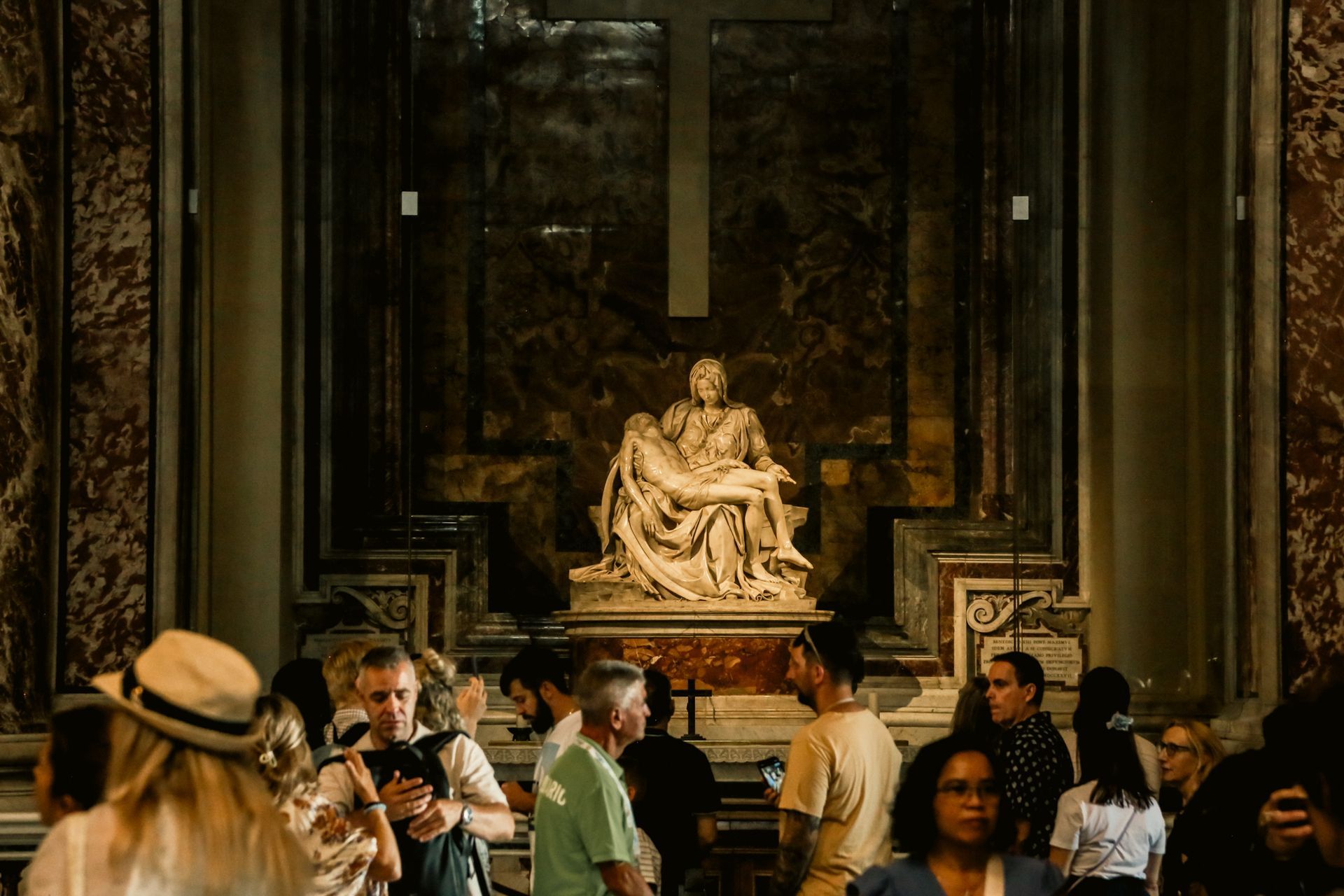 People viewing the Pieta by Michelangelo