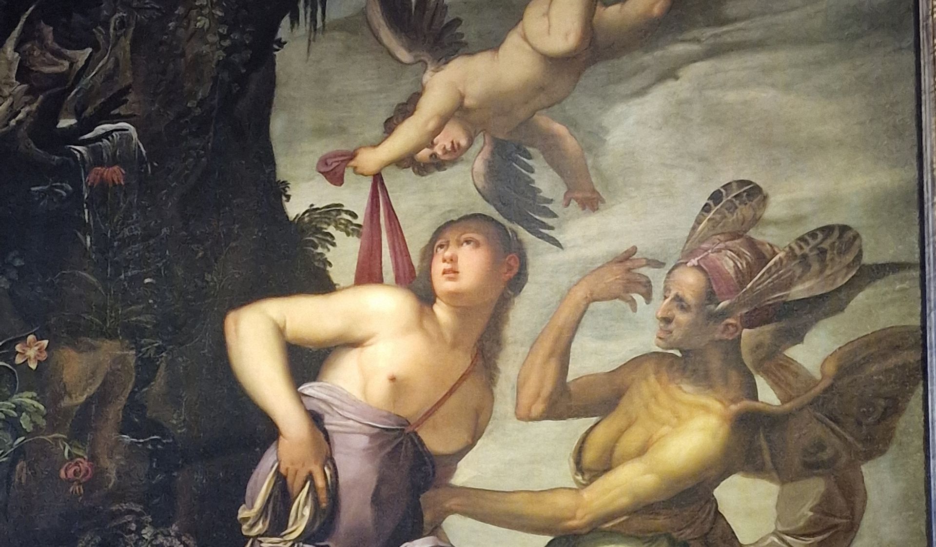 Mythological scene with a woman and a winged figure in flowing robes, with dramatic gestures and dark foliage