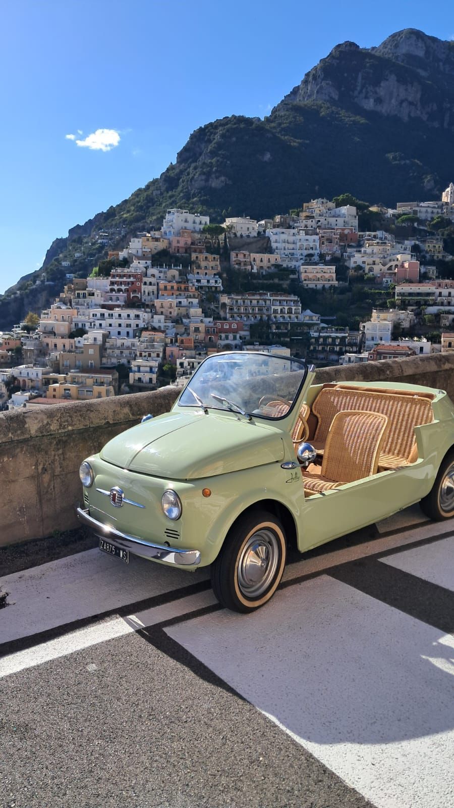 Fiat 500 convertible driving on the Amalfi Coast.