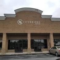 A brick commercial building with the 