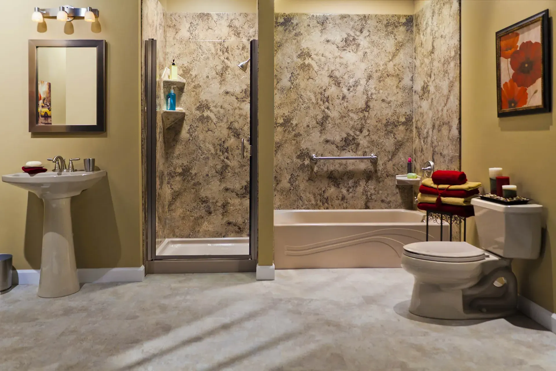 A brown textured rockwall stand-up shower next to a bathtub.