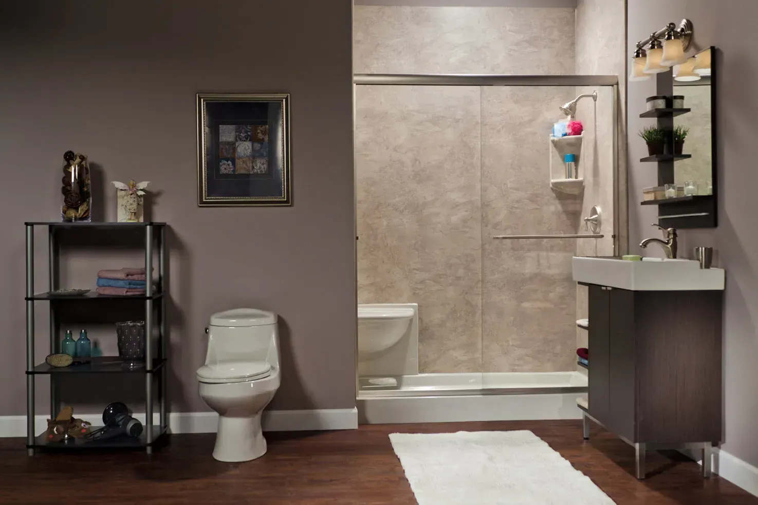 A dark gray bathroom with lightly tan textured shower.