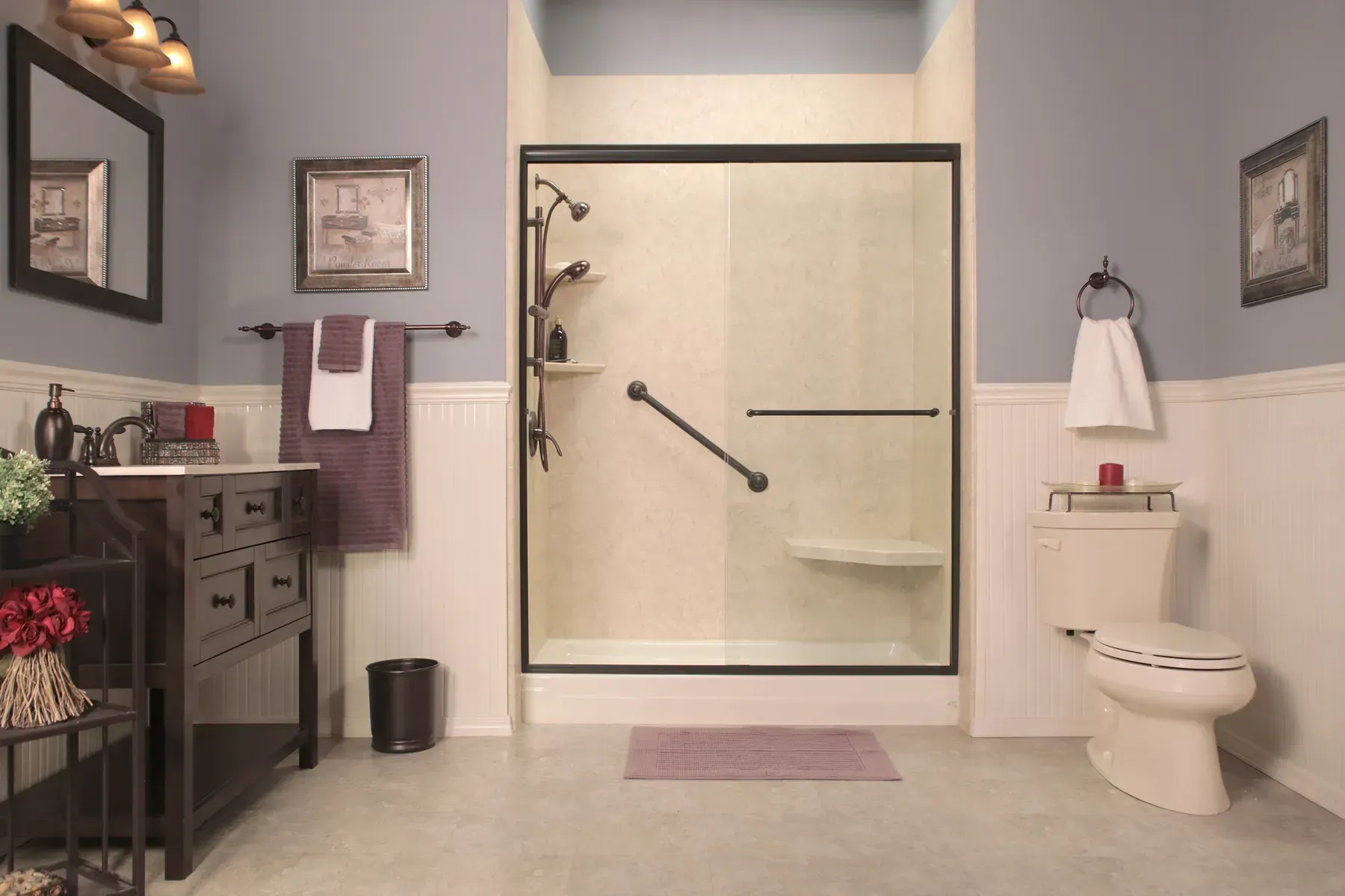 A recently renovated bathroom with a new shower with accessibility features