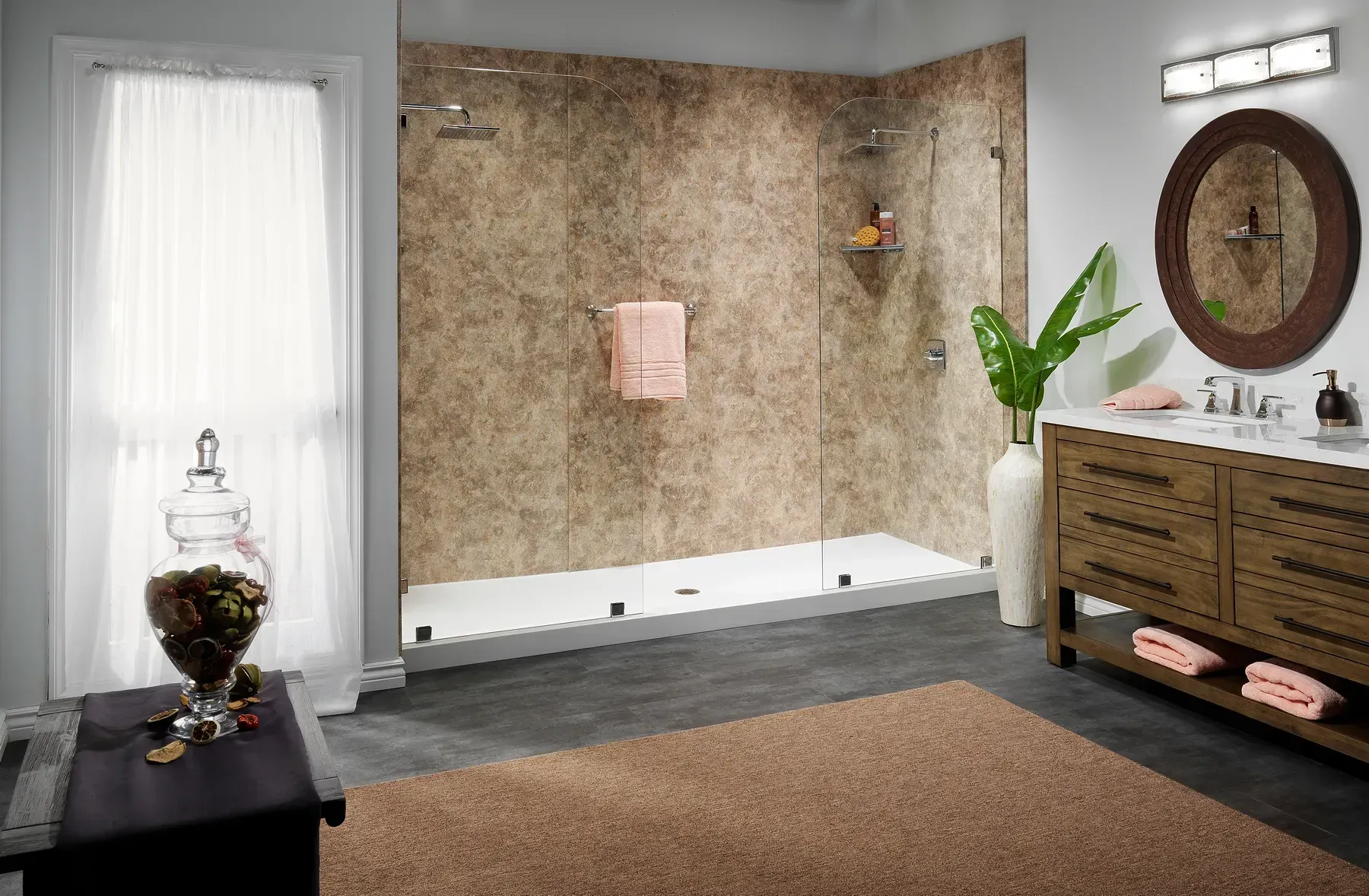 A rockwall textured stand up shower in an open bathroom