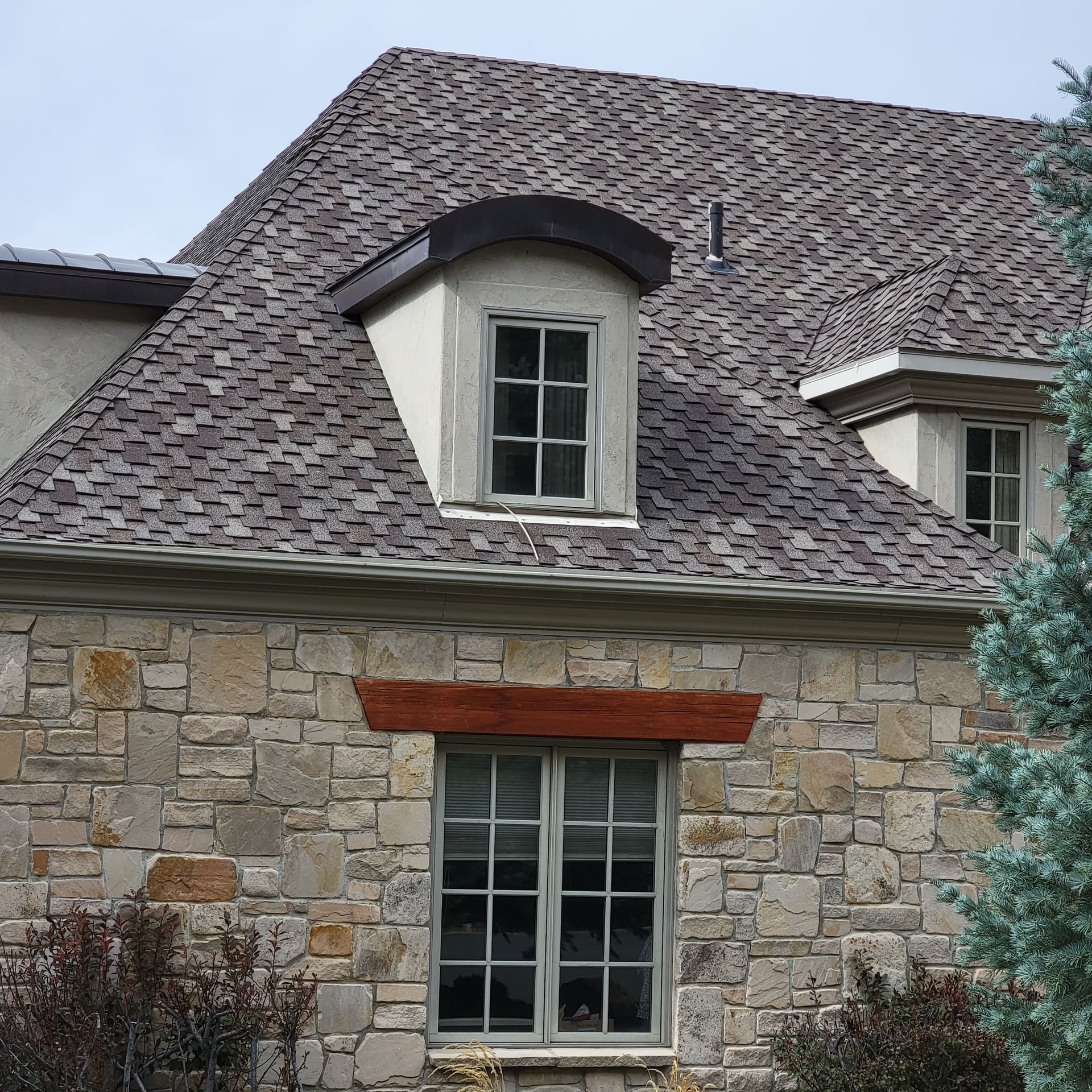 A house with a wooden roof and a window