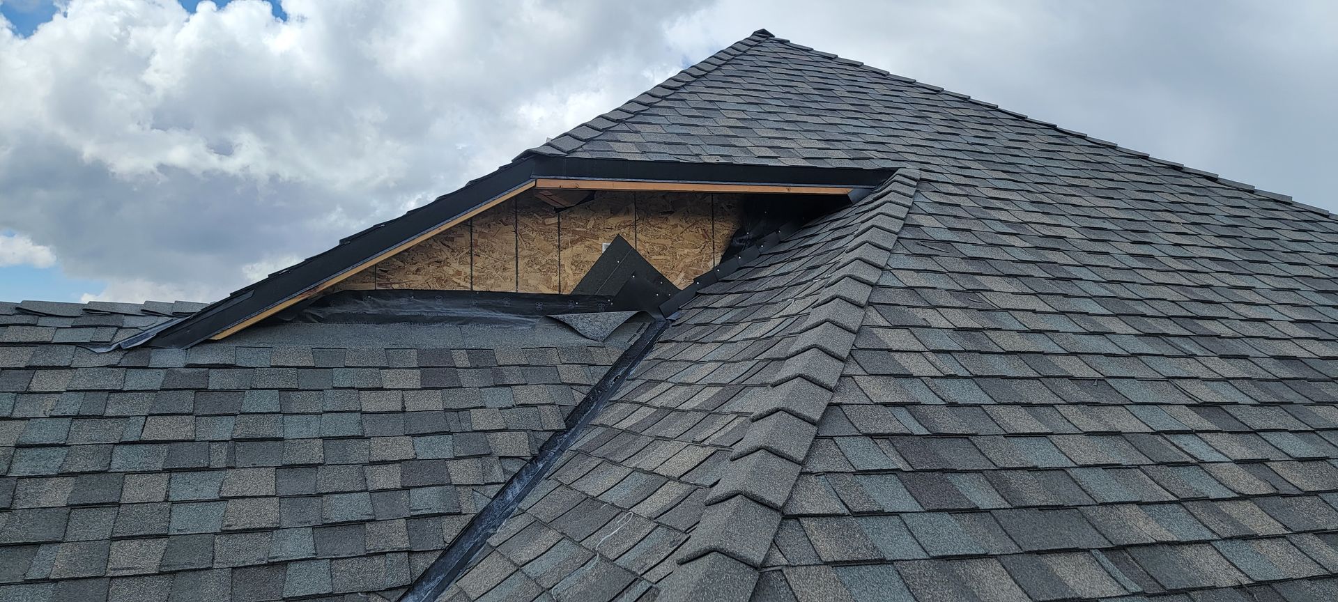 man fixing roof