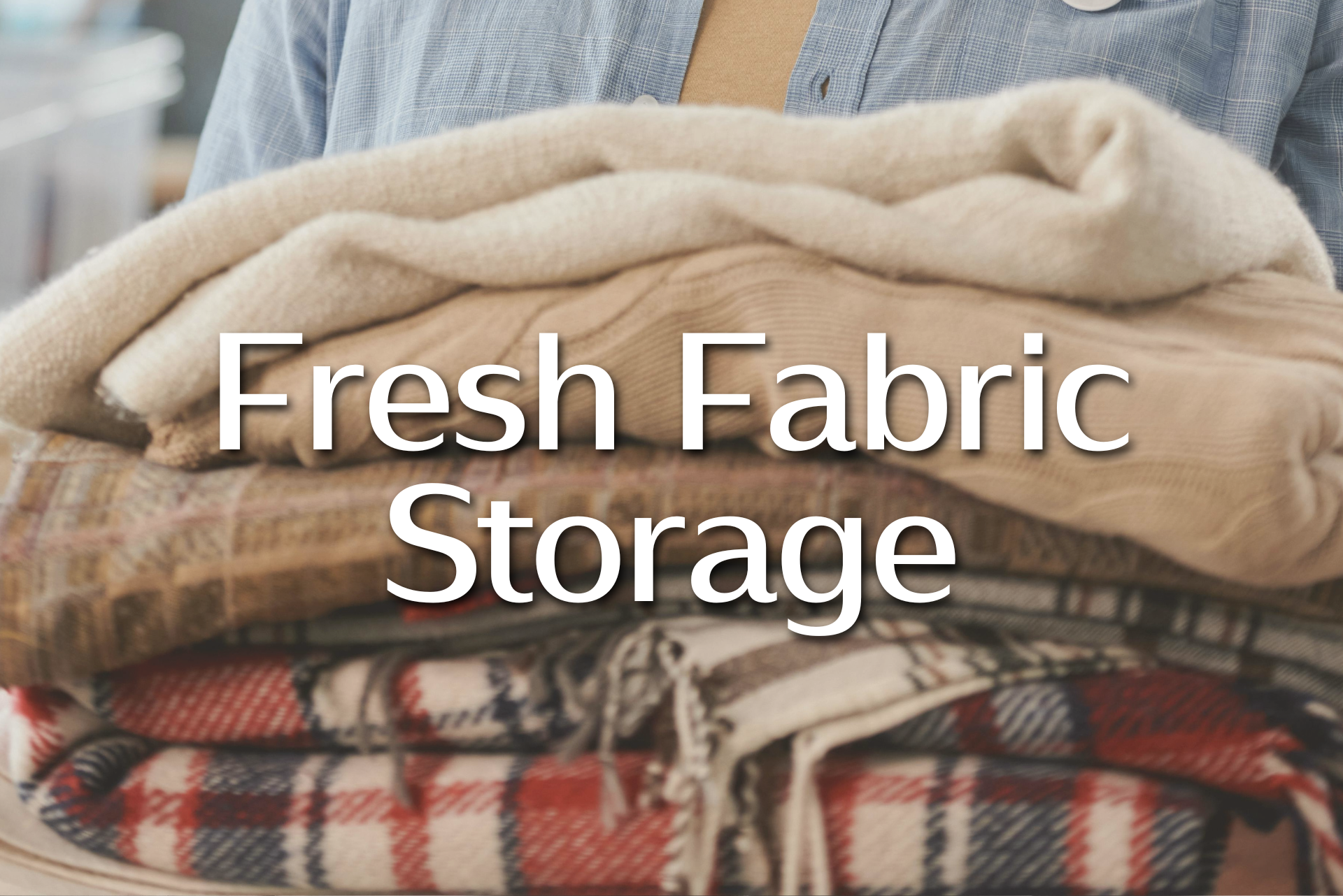 Folded blankets for storage with text Fresh Fabric Storage