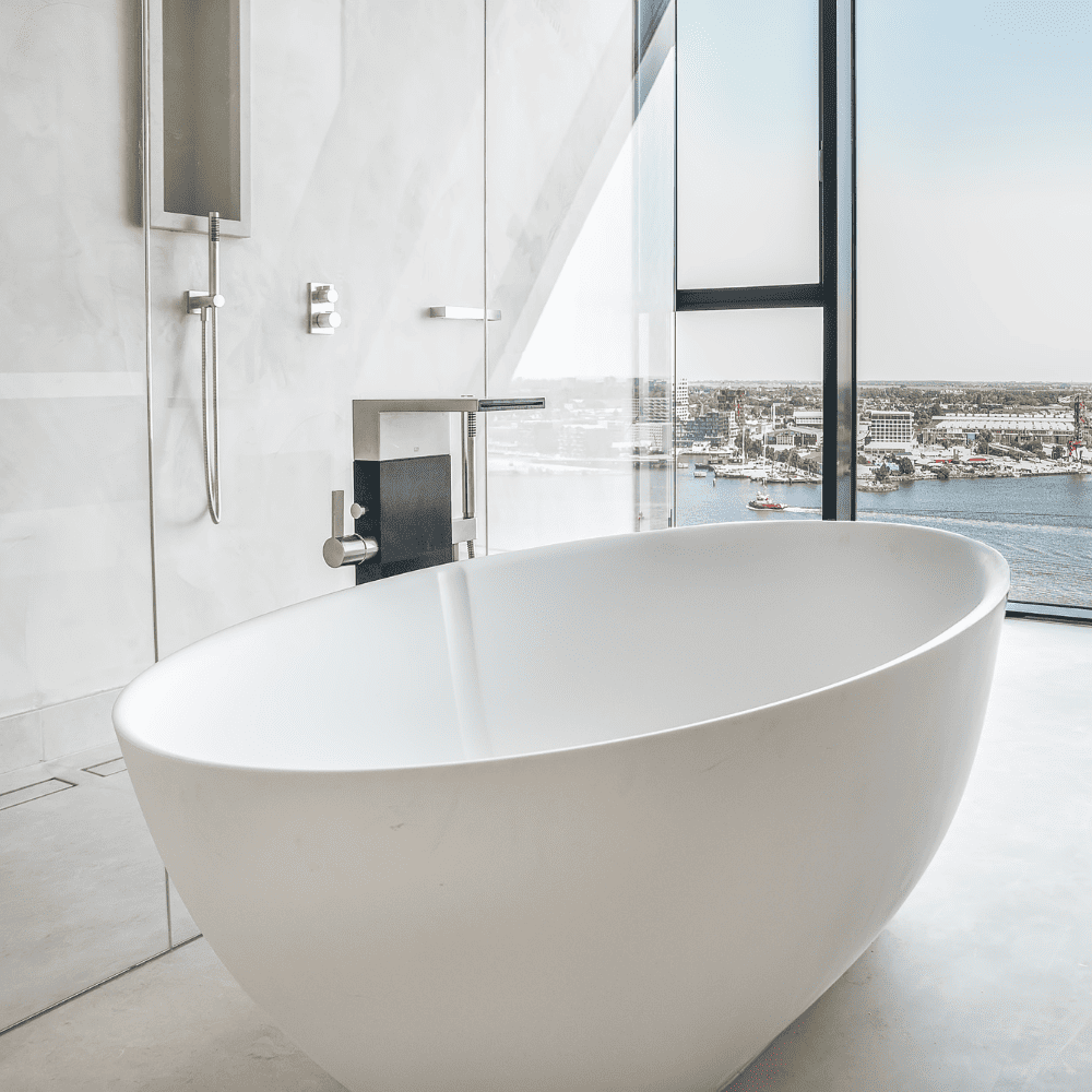 A modern bathtub in a Denver home awaiting conversion into a shower